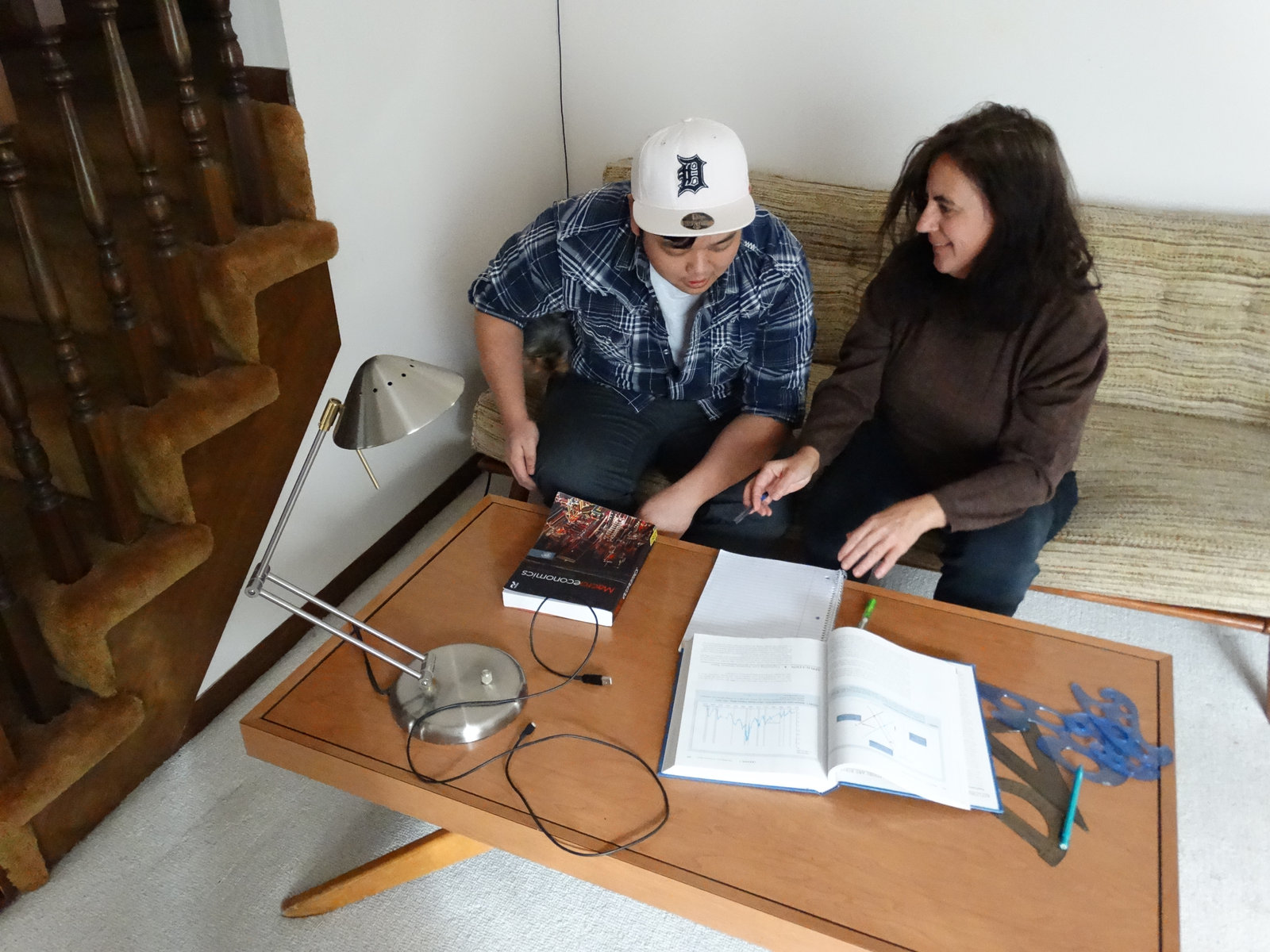 Anna tutoring a high school student